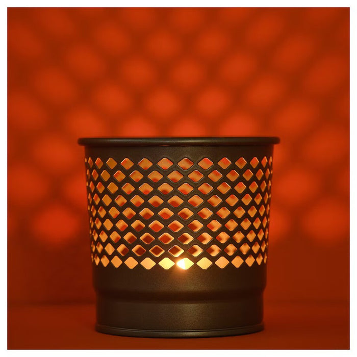 "Versatile IKEA BERGGRAN candle holder suitable for any room."