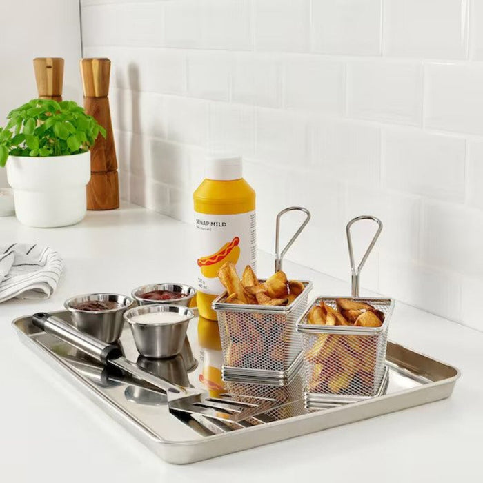 Stainless steel serving tray from IKEA, 40x30 cm (15 ¾x11 ¾ inches). Sleek and durable design, ideal for serving food and drinks.