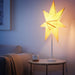 IKEA Table Lamp Base and Shade used in a living room, showcasing its ability to provide stylish and functional lighting