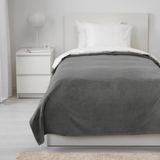 A versatile grey bedspread from IKEA, measuring 150x250 cm, with a lightweight and breathable fabric that is perfect for any season 10384045