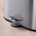 A sleek and stylish IKEA pedal bin with a foot pedal for easy opening and closing.