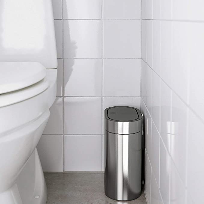 "IKEA's touch top bin in stainless steel for practical and elegant waste management"