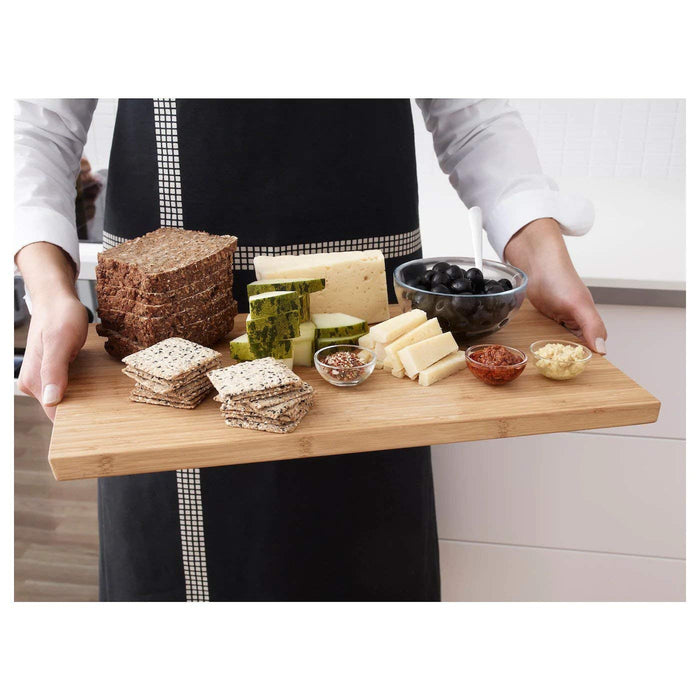 A versatile bamboo chopping board from IKEA, featuring a reversible design for added functionality-20233428