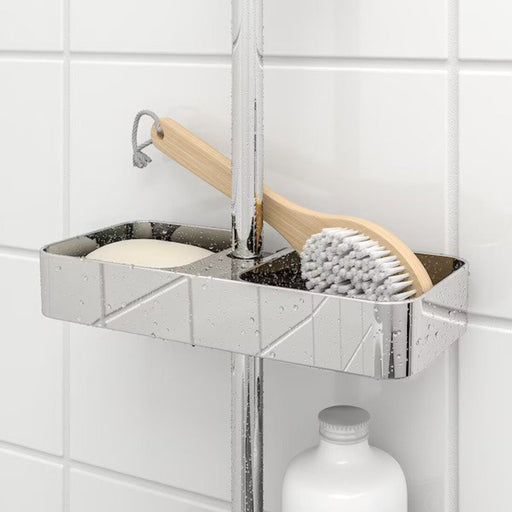 Digital Shoppy A close-up of IKEA's chrome-plated shower shelf with shampoo and conditioner bottles -online india-digital-shoppy-70328527