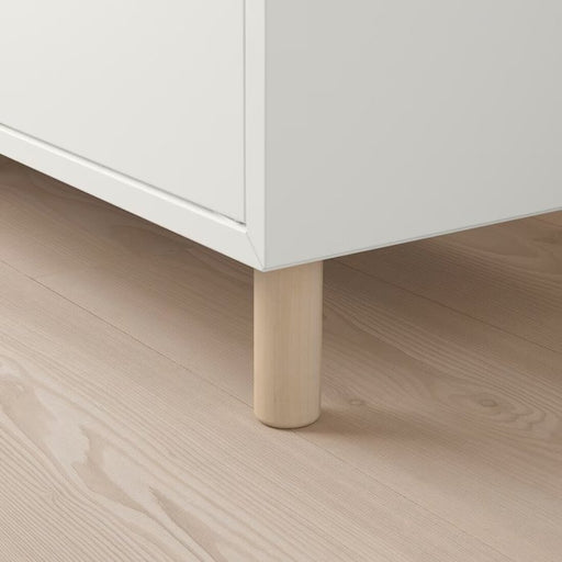 "Wooden IKEA leg with a natural finish for furniture"