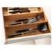 "Sleek bamboo utensil tray with multiple compartments to keep your kitchen tools neatly arranged".