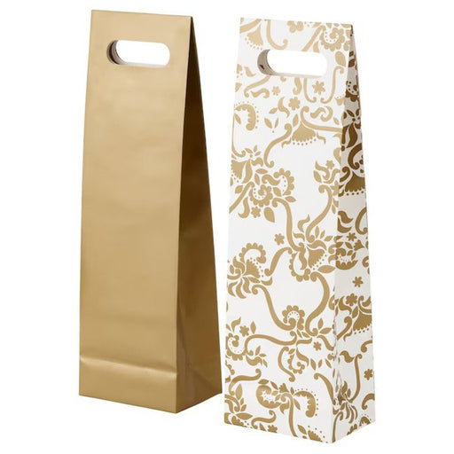 An IKEA gift bag designed to hold a bottle, featuring a festive pattern in white and gold 50528829