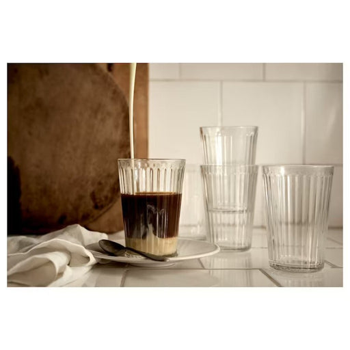 A clear glass from IKEA, ideal for water, cocktails, or any other drink.