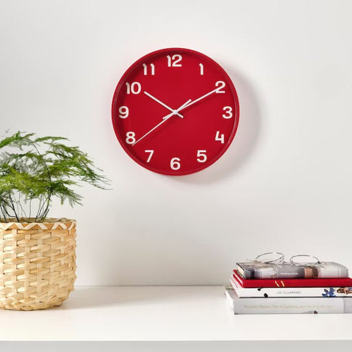 A round wall clock with a bold and graphic design 40510561