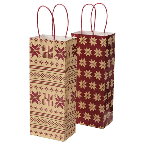 An IKEA gift bag designed to hold a bottle, featuring a festive pattern in red and beige 50499799      