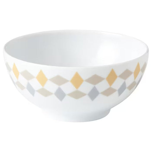 A white/beige Feldspar porcelain IKEA bowl with a smooth and glossy finish.