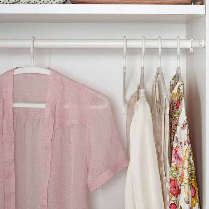 A sleek and modern hanger from IKEA in white, ideal for keeping clothes organized and tidy.