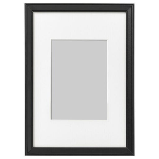 A sleek photo frame with a white mat, perfect for displaying your favorite memories 70387121