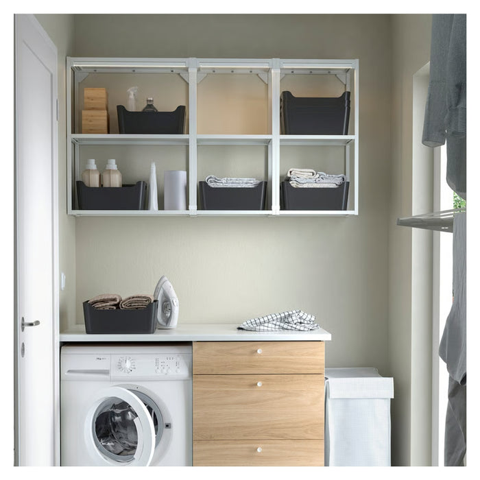  laundry room with shelves, washing machine, dryer, and storage cabinets.