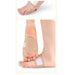 Person wearing beige ankle support brace on a white background