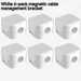 Package contents: 6 magnetic clips + instruction manual on white background