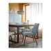 KLINTEN chair by IKEA, brown frame and Kilanda pale blue seat, placed at a dining table in a contemporary space 20547042