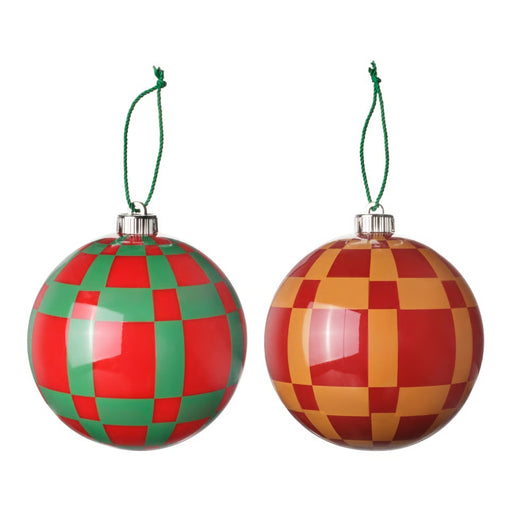 Two checkered Christmas ornaments, one red and green, the other red and yellow, on a white background.