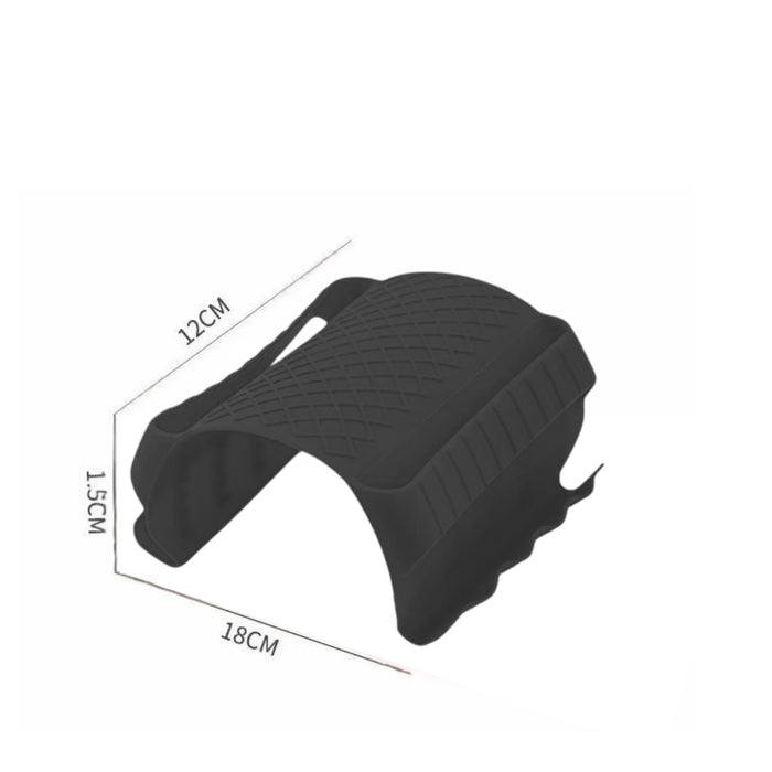 Black rubber grip or protective cover with labeled dimensions—18 cm length, 12 cm width, and 1.5 cm height. The object is likely designed for tool handles, kitchen gear, or heat insulation applications. Its sturdy, textured construction suggests versatility in improving grip or offering protective support.- 1598452898401 13017586
