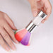 Close-up of crystal handle nail brush showing bristle softness and shine