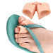 Digital Shoppy silicone toe separator used with flip-flop sandals showing ergonomic fit and comfort