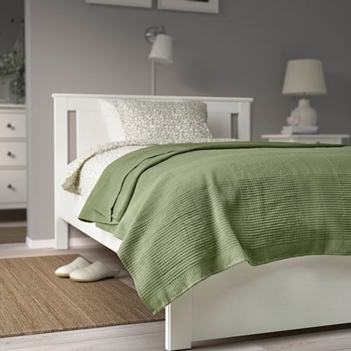 IKEA INDIRA Bedspread in grey-green on a neatly made bed-80582626