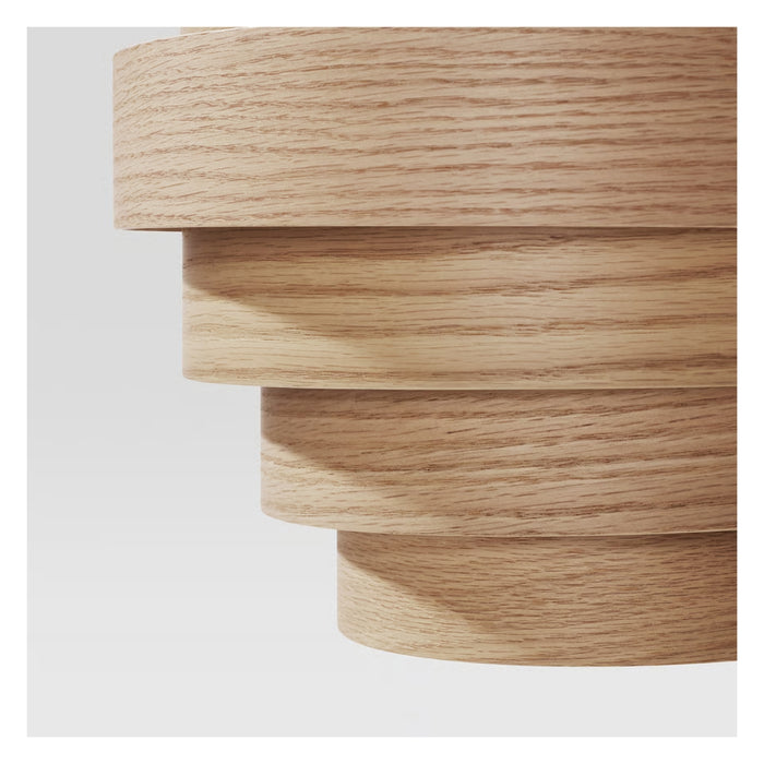 Wooden lamp with a stack of cylindrical shapes on a white background