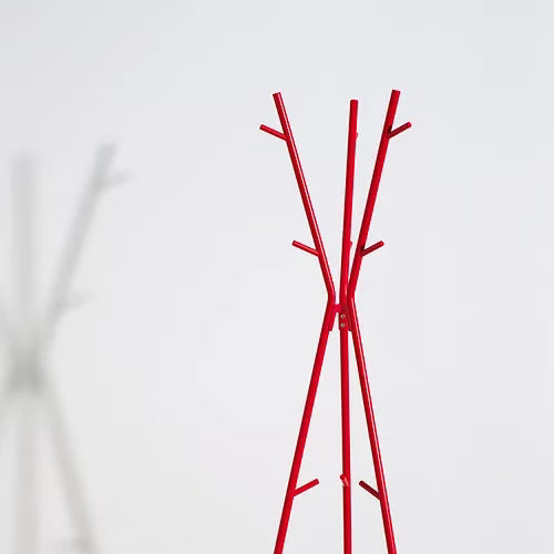 IKEA EKRAR red coat stand placed in home entryway showing tall slim silhouette