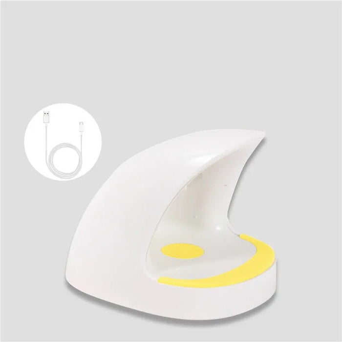 White crescent moon-shaped night light with a yellow accent on a gray background