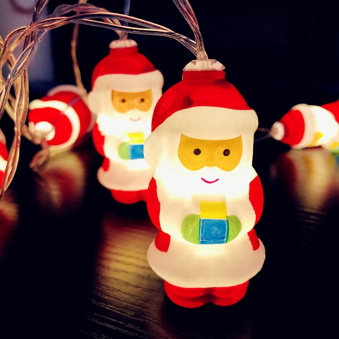 String of Santa Claus-shaped lights on a dark background