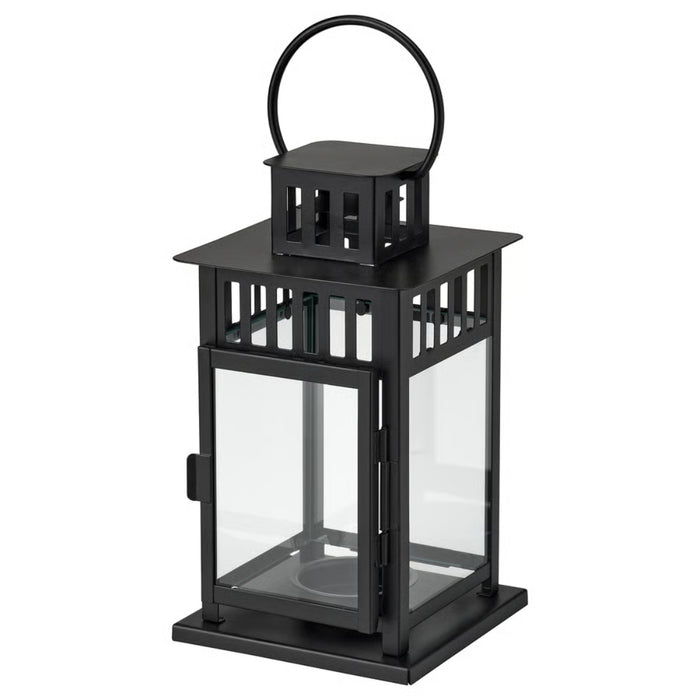 Black lantern with clear glass on a white background