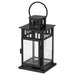 Black lantern with clear glass on a white background