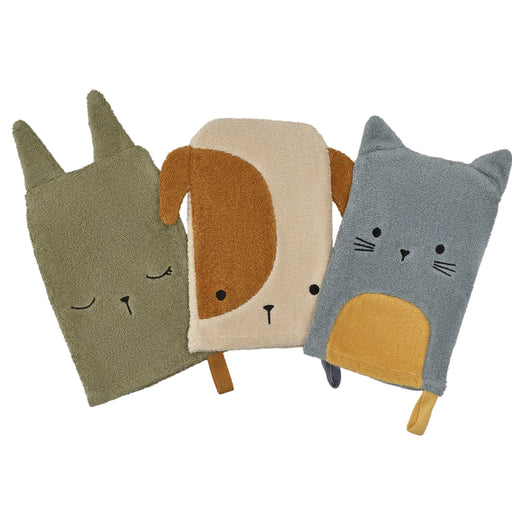 Close-up of IKEA GULDVÄVARE bath mitt in light-colored fabric