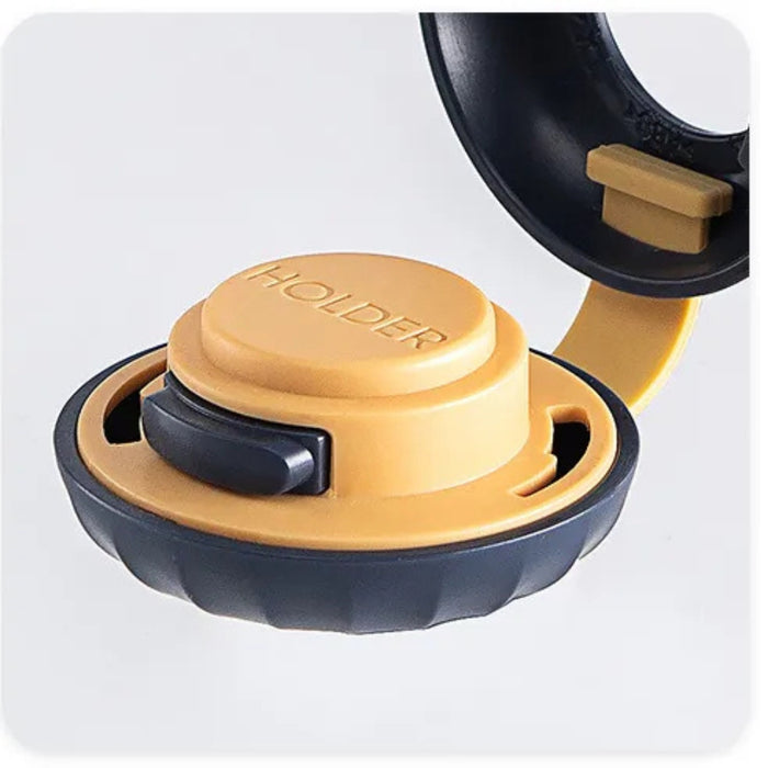 Cooking tool with a yellow base and black top on a white background