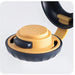 Cooking tool with a yellow base and black top on a white background