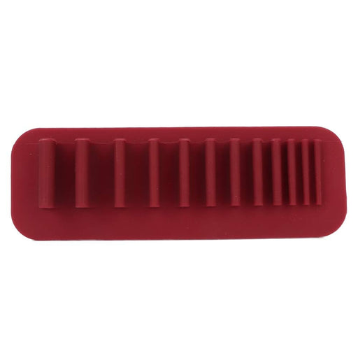 Silicone cosmetic brush with soft applicator head for face masks and skincare creams.