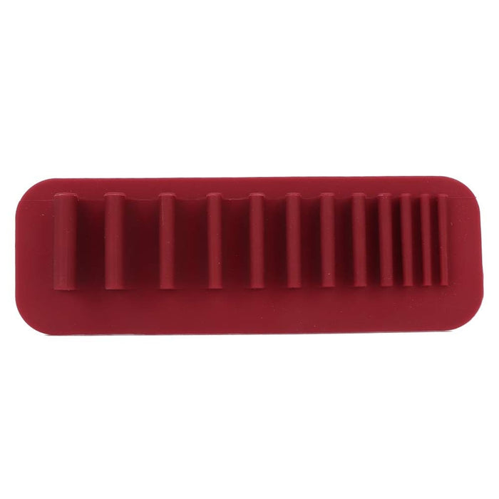 Silicone cosmetic brush with soft applicator head for face masks and skincare creams.