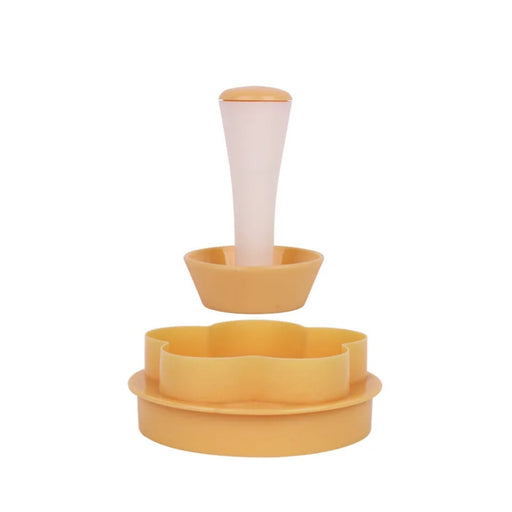 Set of yellow silicone bowls with a white handle on a white background
