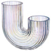Clear glass vase with wavy design on a white background