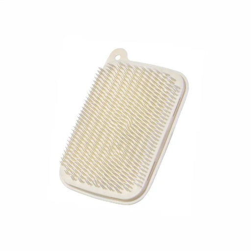 Beige bath brush on a white background