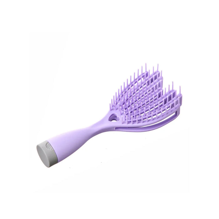 Purple hairbrush on a white background