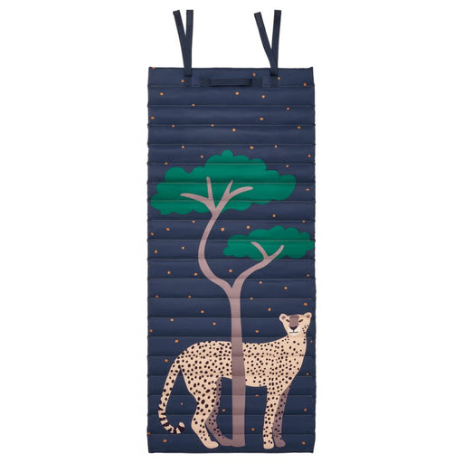 IKEA SANDLÖPARE quilted mat in dark blue with cheetah savannah illustration, featuring tree and scattered orange dot accents, shown flat with hanging loops