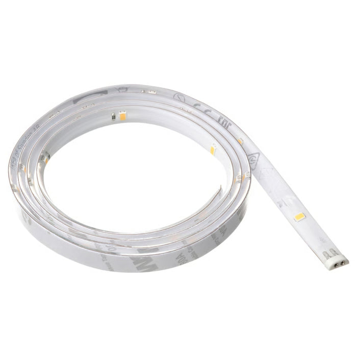 Roll of white LED strip light on a white background