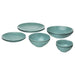Set of teal ceramic plates and bowls on a white background