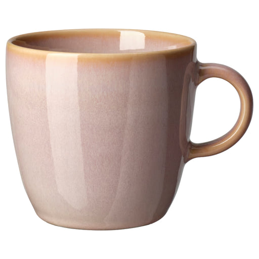 IKEA FÄRGKLAR Mug, light pink, 42 cl, featuring a smooth matte finish and a minimalist design. The sturdy stoneware mug is placed on a neutral-toned surface, showcasing its elegant curved shape and comfortable handle.- 90604883