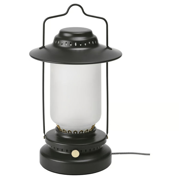 Black lantern-style lamp with a white glass cover on a white background