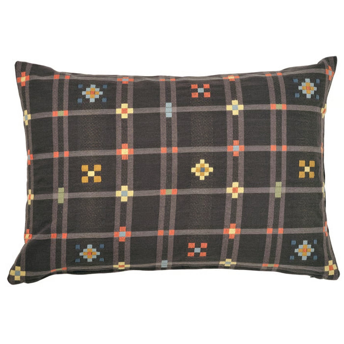 Decorative pillow with a black background and colorful geometric pattern on a white background