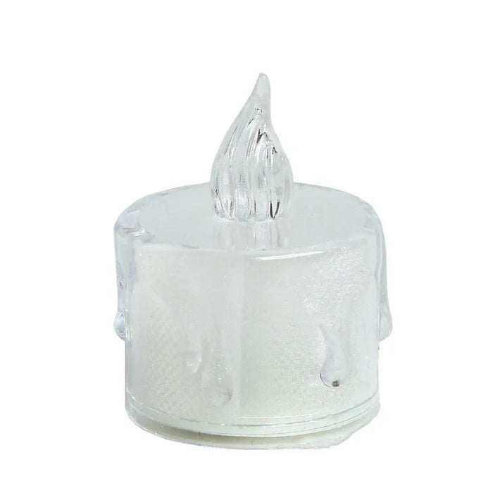 Clear LED candle with flame on a white background