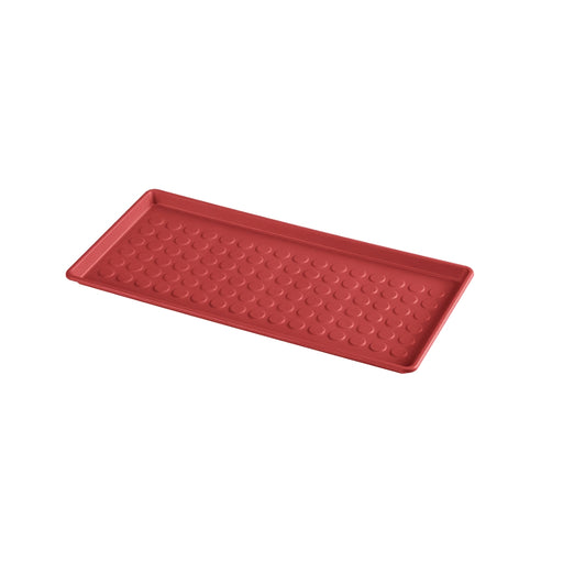 IKEA BAGGMUCK red shoe mat placed near an entryway door