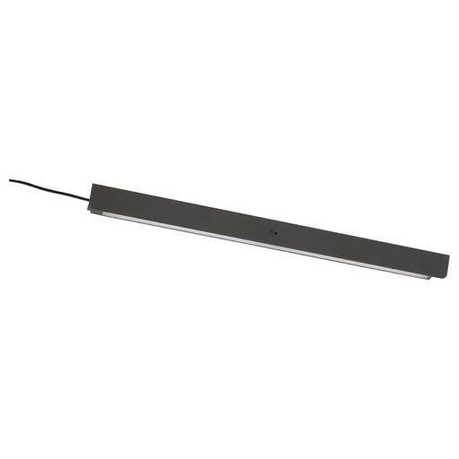 Long, narrow black light fixture on a white background